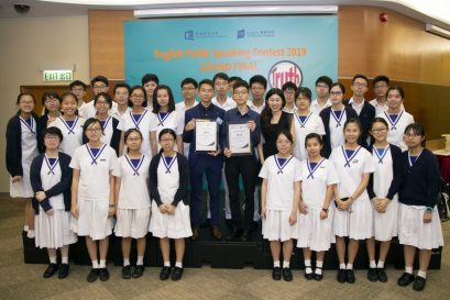 Merit Chan Ho Hin and Lau Pak Hei shared their joy with schoolmates and teacher after contest.